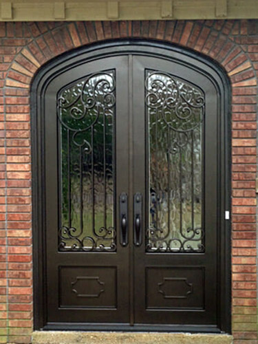 double entry door with pebbled glass and detailing